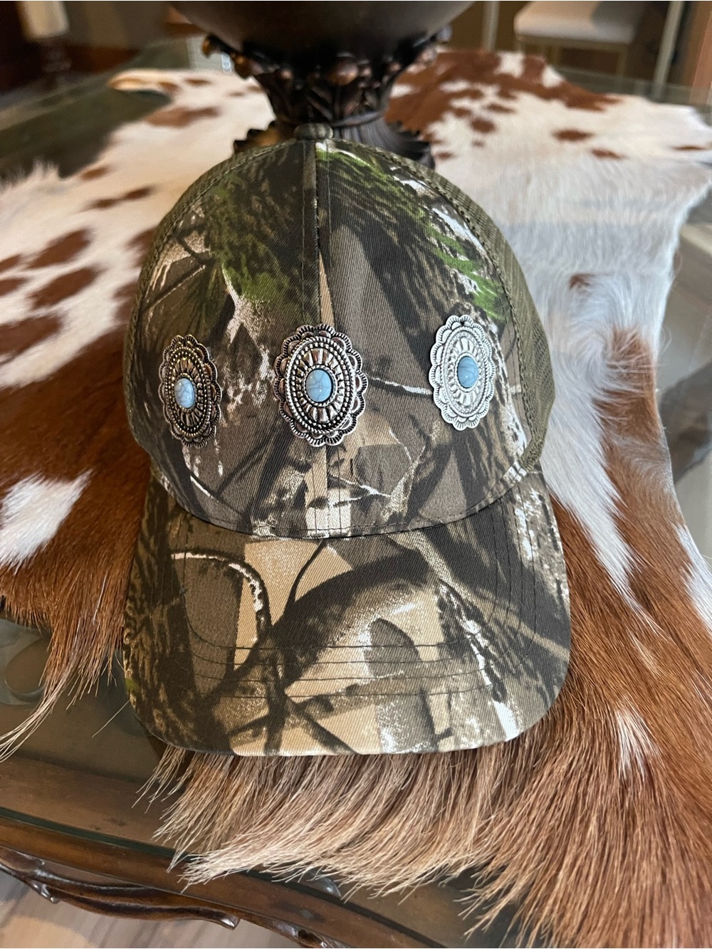 Camo trucker hat with Turquoise Conchos